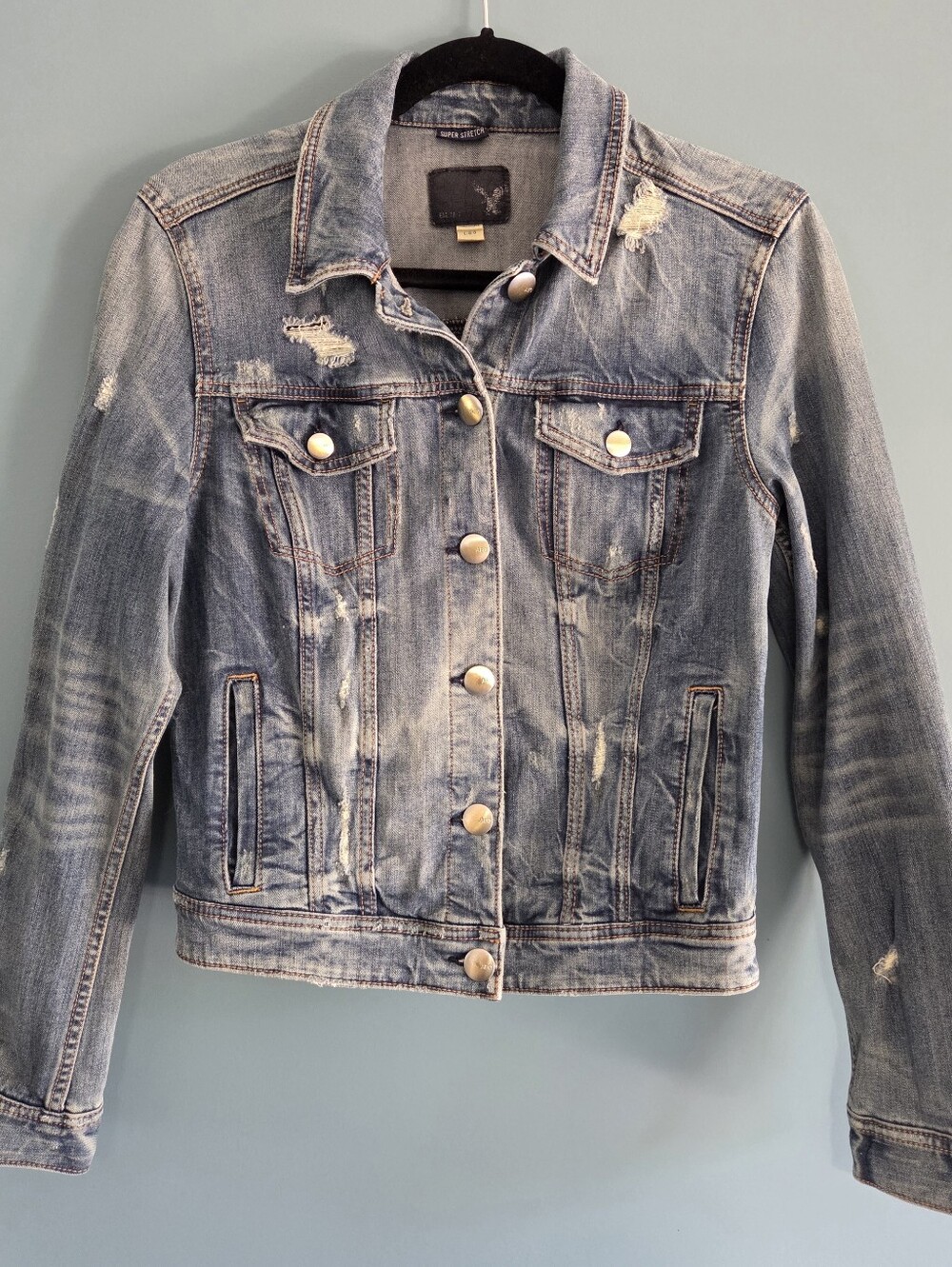 ​American Eagle Outfitters Distressed Super Stretch Denim Trucker Jacket